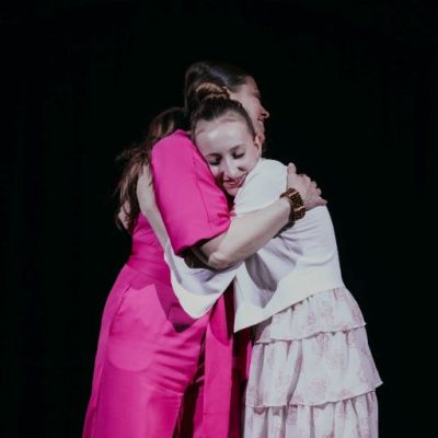 Christina-Lyric-hug-testimonial Christina and Lyric hugging after a recital.